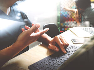 One of the perks of having your own desk at the office is the ability to personalize it in a way that makes you comfortable and more productive. (Shutterstock)