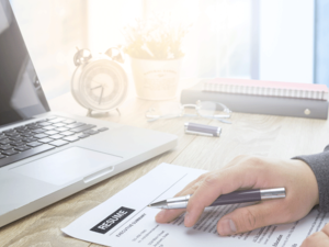 If you truly want to stand out all other candidates, you’ll need to put on your detective hat on and search high, low and everywhere in between and find out all that you can about a company before attending an interview. (Shutterstock)