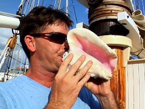 Conch Shell Blowing Contest. (YouTube Screenshot)