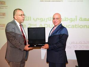 الدكتور محمد فتيحة، مدير حرم جامعة أبوظبي في العين ورئيس قسم التربية، والدكتور جورج نادر، مدير التنفيذي لمبادرة إن جي إي.  