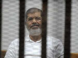 Deposed former president Mohamed Morsi in court (AFP/File Photo)