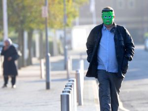 Masked Aaron Jones (Twitter)