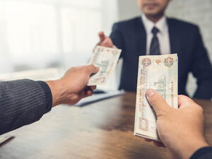 The new online service called BuyBack Bazaar enables access to instant cash to customers who sell their possessions such as a phone or laptop and then have the option to buy it back at a later date. (Shutterstock)