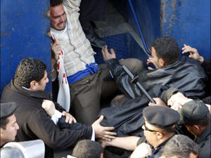 "الجماعة المحظورة"  في إشارة إلى جماعة الإخوان المسلمين