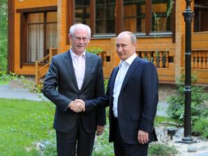 Russia's President Vladimir Putin shakes hands with EU President Herman Van Rompuy (Mikhail Klimentyev/ AFP)
