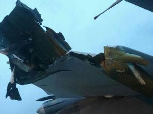 ارشيف/ طائرة روسية تعرضت لاضرار اثر قصف شنه مسلحون من المعارضة على قاعدة حميميم الجوية