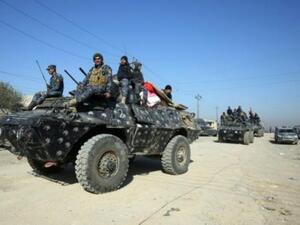 قوات عراقية تتقدم في قرية البوسيف
