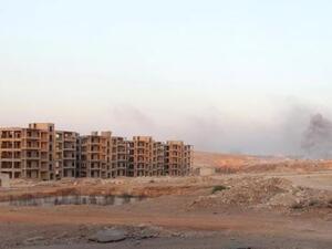 دخان يتصاعد بالقرب من منطقة 1070 شقة بجنوب غرب حلب

