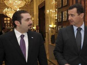 الرئيس السوري بشار الاسد مستقبلا سعد الحريري خلال احدى زياراته الى دمشق