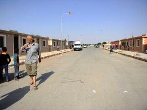 أشخاص تم ترحيلهم من داريا في معسكر في منطقة خاضعة لسيطرة الحكومة في دمشق
