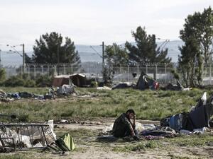 A refugee sits on the ground near destroyed tents during a police operation to clear a makeshift camp for refugees and migrants at the border between Greece and Macedonia near the village of Idomeni, northern Greece on May 25, 2016. (AFP/Yannis Kolesidis) A refugee sits on the ground near destroyed tents during a police operation to clear a makeshift camp for refugees and migrants at the border between Greece and Macedonia near the village of Idomeni, northern Greece on May 25, 2016. (AFP/Yannis Kolesidis)