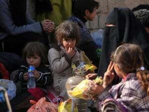 نازحون عراقيون هربوا من قرية شهرزاد في الموصل
