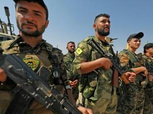 عناصر من حماية الشعب الكردية

