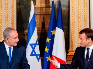 الرئيس الفرنسي إيمانويل ماكرون وئيس الوزراء الإسرائيلي بنيامين نتنياهو