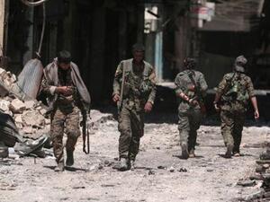 مقاتلون من قوات سوريا الديمقراطية في مدينة منبج بمحافظة حلب
