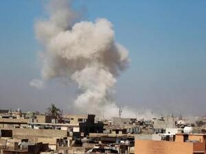 دخان يتصاعد في سماء الموصل بعد اشتباكات بين القوات العراقية ومسلحي تنظيم الدولة الاسلامية 
