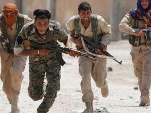 مقاتلون من وحدات حماية الشعب الكردية
