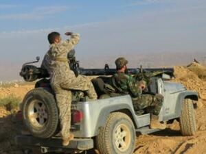 مقاتلون موالون للنظام السوري في موقع في جرود القاع في منطقة القلمون في ريف دمشق
