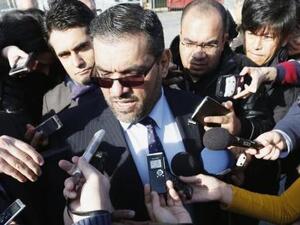 المعارض السوري أنس العبدة يتحدث لوسائل الإعلام في جنيف

