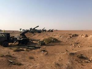 مرابض مدفعية سورية في بلدة السويسة عند تخوم البوكمال

