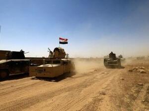 آليات عسكرية لقوات مكافحة الإرهاب العراقية خلال اشتباك مع مقاتلين من الدولة الإسلامية في تلعفر

