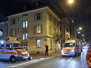 Ambulance and police cars are seen outside a Muslim prayer hall, central Zurich, on December 19, 2016, after three people were injured by gunfire. (AFP/Michael Buholzer)