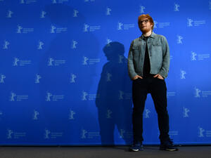 The 27 year old singer sparked rumors him and Cherry had already got hitched after he was spotted wearing a plain silver band on his ring finger. (Source: JOHN MACDOUGALL - AFP)