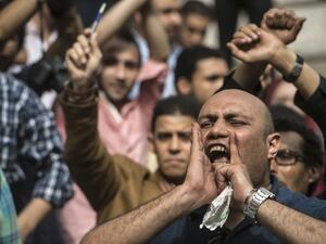Egyptian journalists protest outside of Syndicate headquarters in Cairo on World Press Freedom day. (AFP/Khaled Desouki) Egyptian journalists protest outside of Syndicate headquarters in Cairo on World Press Freedom day. (AFP/Khaled Desouki)