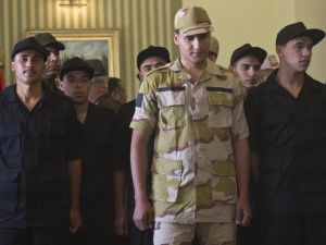 Egyptian police and soldiers who were seized in Sinai by kidnappers are seen upon their arrival at Almaza military Airbase in Cairo on May 22 (Khaled Desouki / AFP)