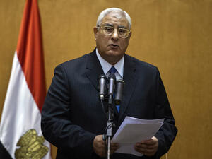 Egypt's interim President Adly Mansour addresses the country after he's sworn in (AFP)