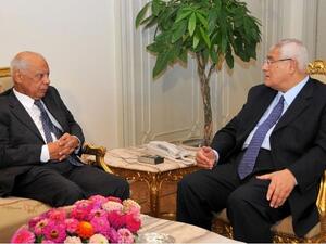 Egypt's interim president Adly Mansour (R) meeting with with new-appointed Prime Minister Hazem al-Beblawi, on July 9 (AFP/ Egyptian presidency)