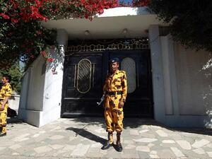 Yemeni soldiers stand guard in front of the Iranian ambassador's residence in Sanaa, on January 18, 2014. [AFP]
