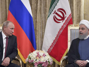 الرئيس الروسي، فلاديمير بوتين، ونظيره الإيراني، حسن روحاني
