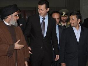 Foreign groups loyal to Syrian President Bashar al-Assad’s ready to fight alongside Syria. [Getty Images]