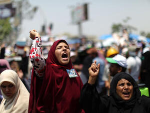 Women out in force for the sexual fatwa to bolster their main man Morsi  (AFP PHOTO / MAHMUD HAMS)
