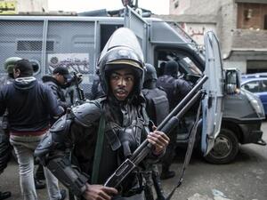 Members of the Egyptian police special forces patrol streets in al-Haram neighborhood of Cairo on Jan. 25, 2016 in order to head off potential protests against President Abdel Fattah al-Sisi's government. (AFP/Mahmoud Khaled)
