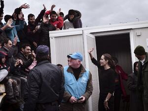 The UNHCR Special Envoy struggled to move through the crowds.  (AFP/Louisa Gouliamaki)