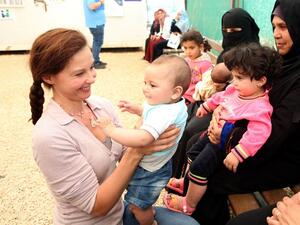 Ashley Judd has also visited countries around the world as an activist for YouthAIDS.  (AFP/Khalil Mazraawi)