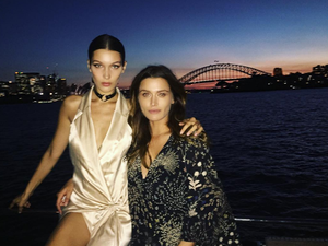 Bella poses for a sultry sundowner by Harbour Bridge. (Instagram/Bella Hadid)