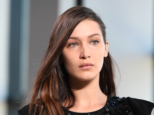 Bella took the fall in her stride, and later posted her injury on Snapchat. (AFP/Angela Weiss)