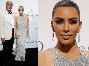 A finery pair: Kim and Fawaz were never far apart during the event. (AFP/Jean Christophe Magnenet) 