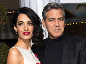 Most wanted: Amal and George Clooney. (AFP/Kevin Winter)