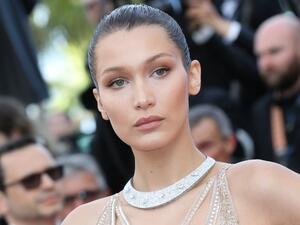 Outshining them all: Bella wore a de GRISOGONO 'High Jewellery' necklace and Cavalli gown.  (AFP/Valery Hache)