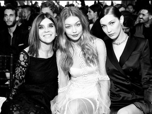 The Hadid sisters with Carine Roitfeld, who won Magazine of the Year for her CR Fashion Book.  (Instagram/Carine Roitfeld)