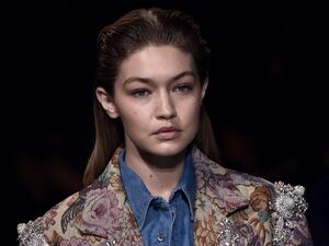 Bare-faced but ornately adorned Gigi Hadid. (AFP/Martin Bureau)