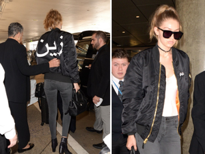 Gigi's name is on her chest. but Zayn's got her back. (Luis/X17online.com)