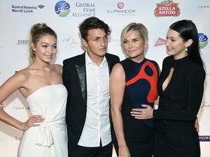 A model mum and beautiful babes: Yolanda Foster with Gigi, Anwar and Bella Hadid. (AFP/Getty/Dimitrios Kambouris)