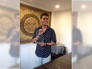Mohammed Assaf and his new award. (Facebook)