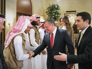 Theeb's director Naji Abu Nowar presents the cast and crew to King Abdullah and Queen Rania, at a reception in their honor.  (Photo credit: Twitter/Royal Hashemite Court)