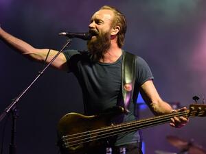 Barely recognizable, but Sting still had the crowd in full-on karaoke mode. (AFP/Fadel Senna)